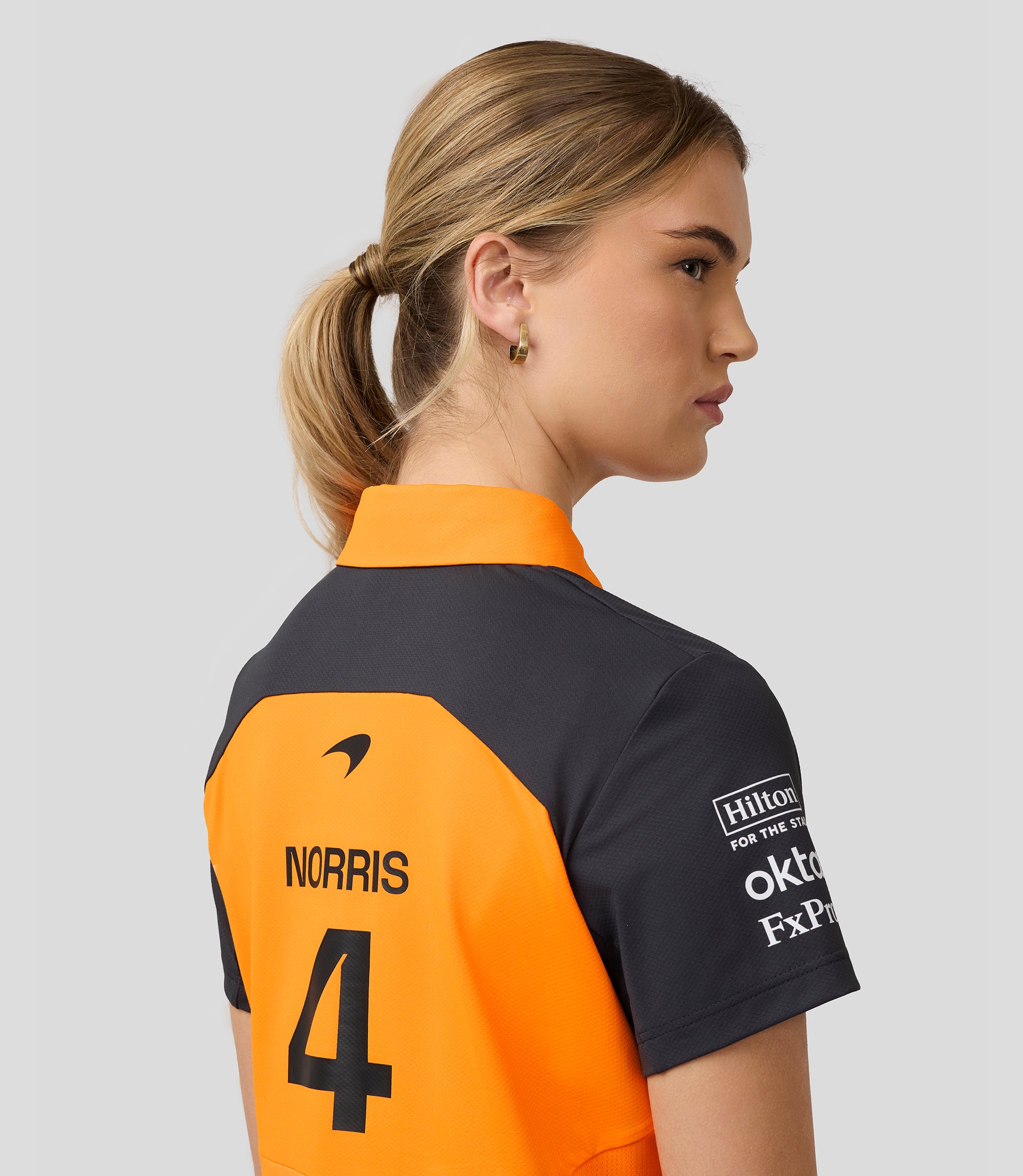 Official Womens McLaren Formula 1 Team Polo Shirt Lando Norris - Papaya/Phantom 6 Official Womens McLaren Formula 1 Team Polo Shirt Lando Norris - Papaya/Phantom